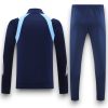 madrid-white-with-dark-blue-retro-model-tracksuit-Photoroom.jpg Chándal Real Madrid 2025-2026 Alternativo 2 – Cremallera