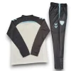 malaga25-26whitewithblacktrainingsuit1_1.webp Chándal Málaga 2025-2026 – Entrenamiento